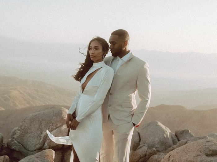 Black couple on top of a mountain wedding photography