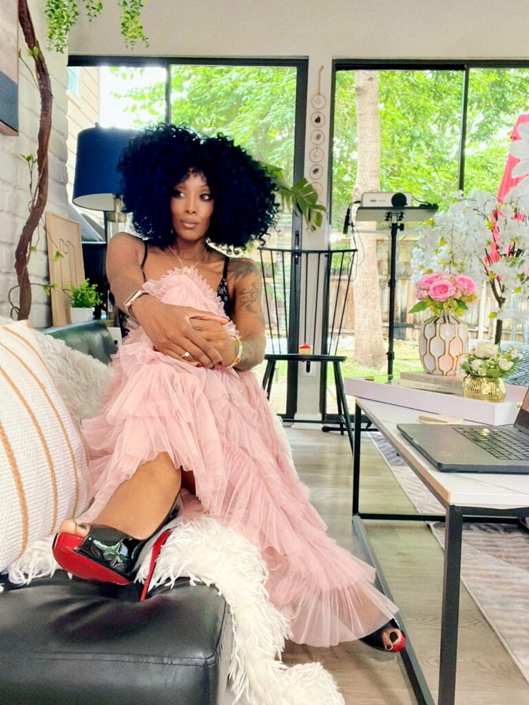 African American woman style with a pink tutu skirt and heels