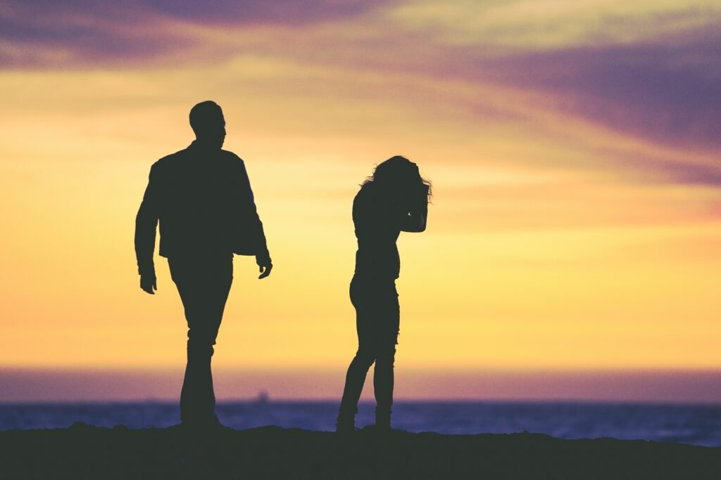 silhouette of a couple negotiating