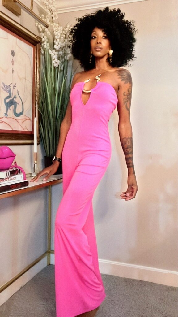 woman in a pink strapless jumpsuit
