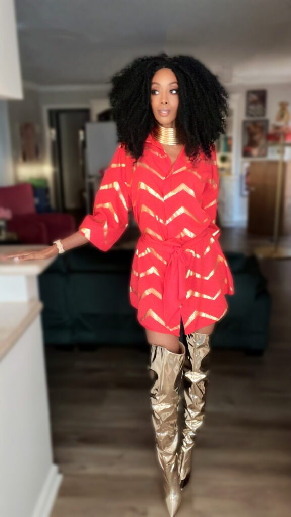 woman with skinny legs wearing gold metallic boots