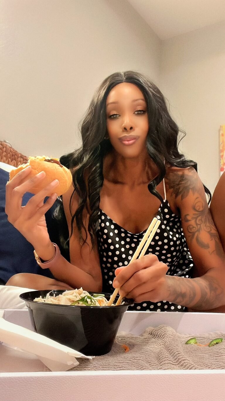 Midlife woman sitting alone representing the worthy but not deserving trap where women feel inherently valuable but struggle to believe they deserve rest and self-care